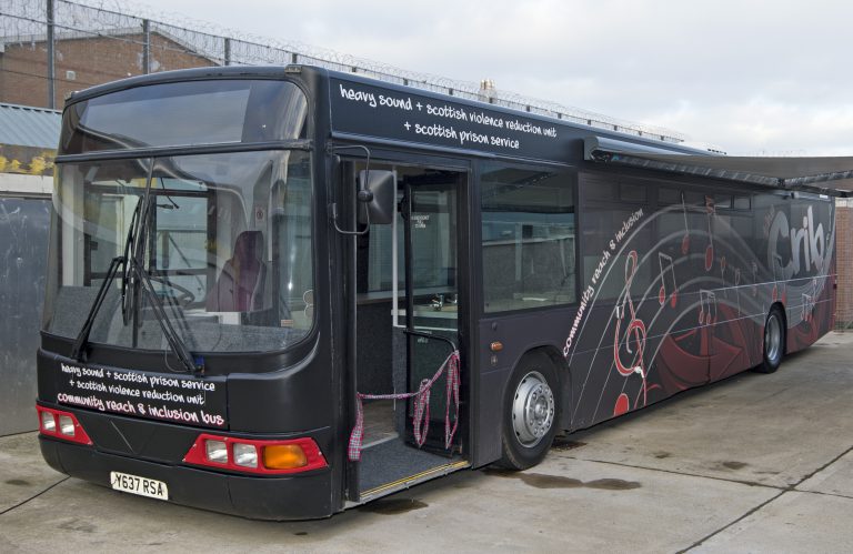 A picture of the Heavy Sound, SVRU and Scottish prison service CRIB bus, a mobile community centre